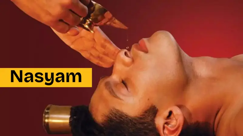 Nasyam Ayurveda therapy, one guy is taking nasyam therapy
