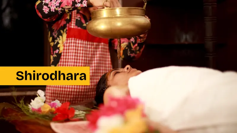 person receiving Shirodhara therapy in a serene Kolkata spa