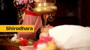 person receiving Shirodhara therapy in a serene Kolkata spa